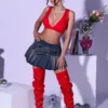 Top Tucked Into Pleated Denim Skirt